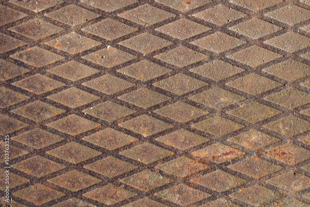 Diagonal pattern on an old iron plate