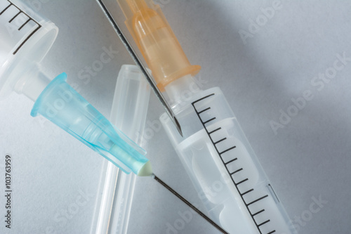 syringes with needles on a white background 