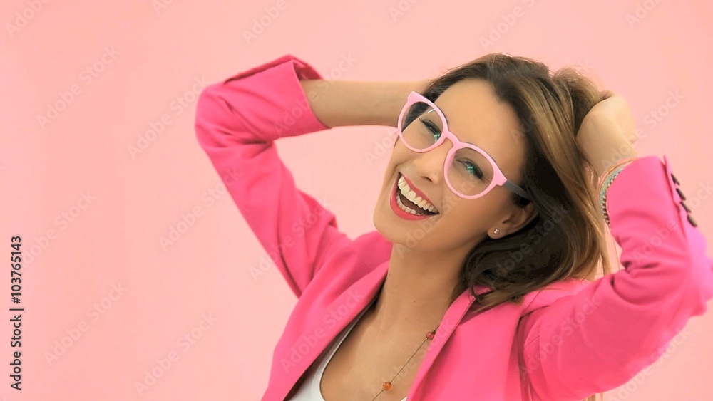 Cheerful model wearing eyeglasses, studio shot Cheerful model wearing eyeglasses, studio shot