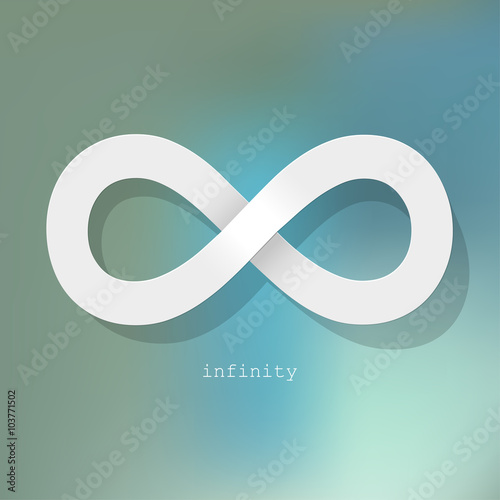 Infinity symbol white on a ligt blue bokeh fog background.