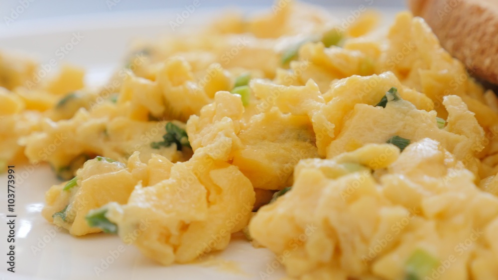Tasty omelete with green fresh scallion and toasted bread on ceramic plate slow panning 4K 2160p UHD footage - Beaten eggs with young fresh onions and bread food 4K 3840X2160 UltraHD panning video Tasty omelete with green fresh scallion and toasted bread on ceramic plate slow panning 4K 2160p UHD footage - Beaten eggs with young fresh onions and bread food 4K 3840X2160 UltraHD panning video
