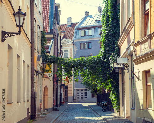 Fototapeta Naklejka Na Ścianę i Meble -  Old medieval summer street in Riga, Latvia.