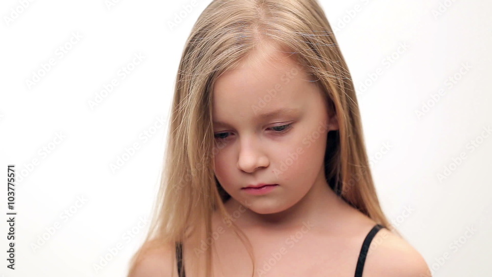 Little girl with blond hair shows sadness, sorrow. Little girl with blond hair shows sadness, sorrow.