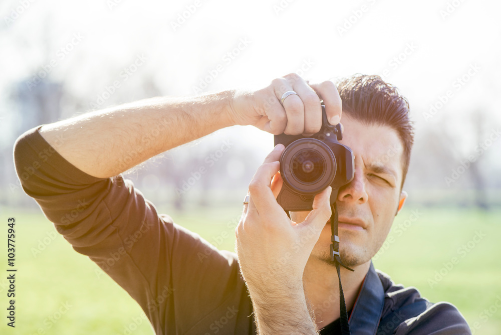 Fototapeta premium Photographer with camera