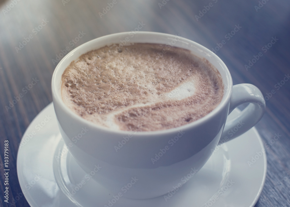 cup of coffee on table cup of coffee on table