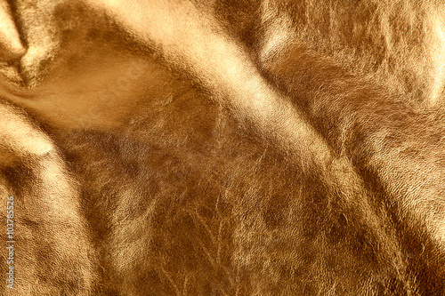 Golden leather texture close up