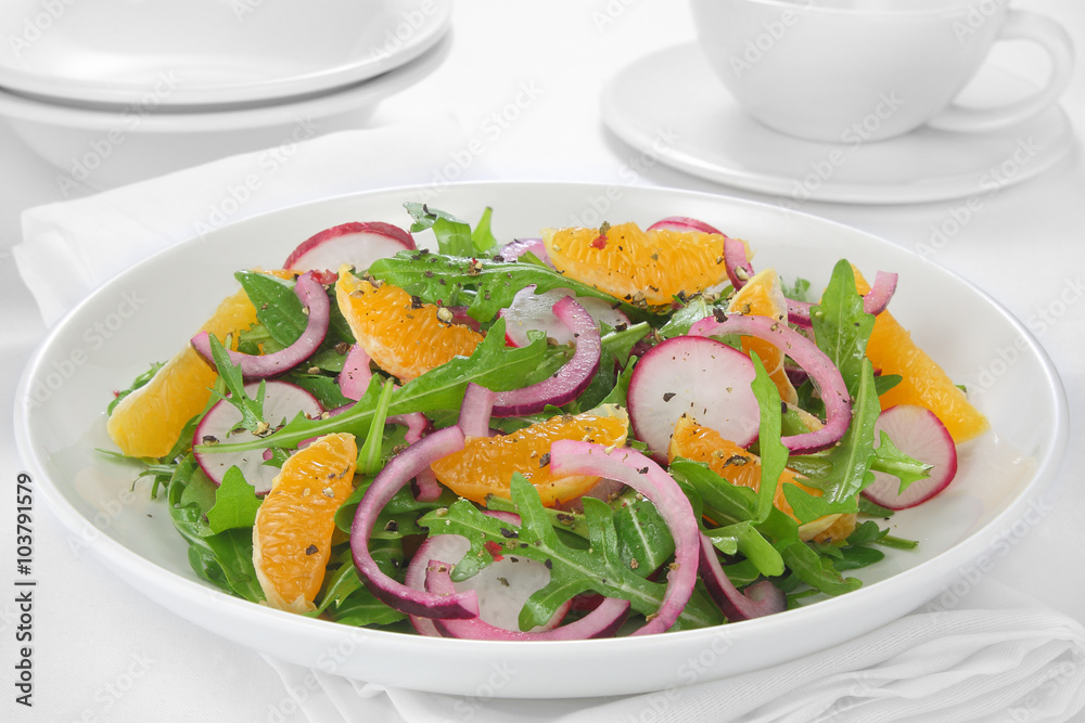 Salad with arugula, radish,red onion and tangerine Salad with arugula, radish,red onion and tangerine