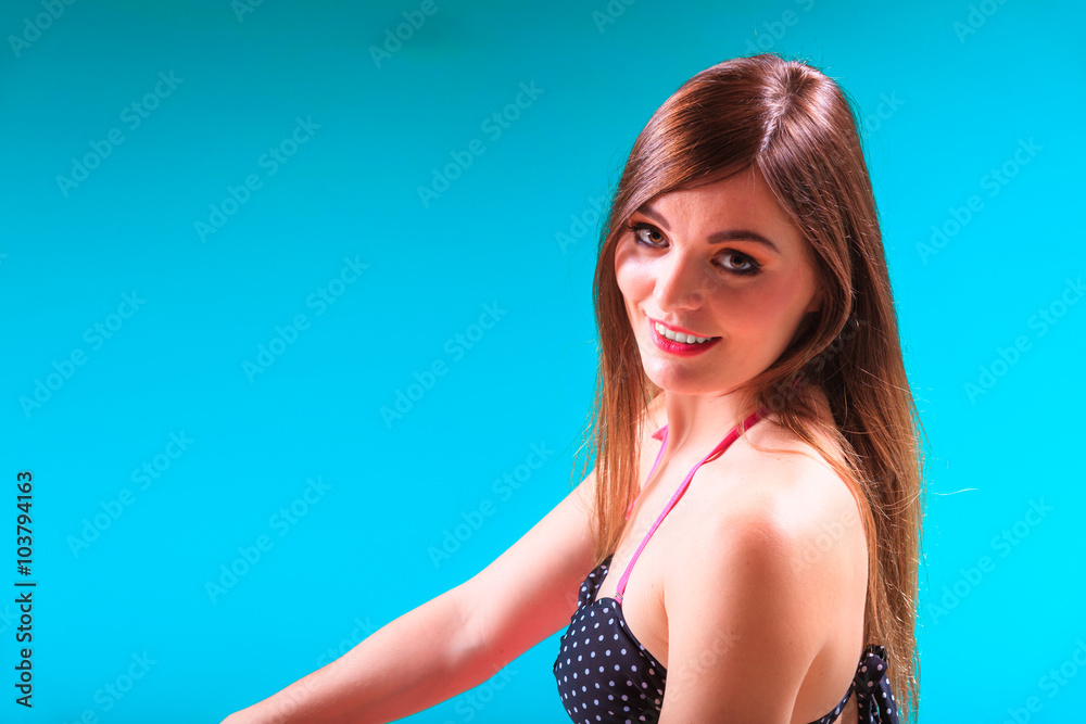 Portrait of seductive woman at poolside edge. Portrait of seductive woman at poolside edge.