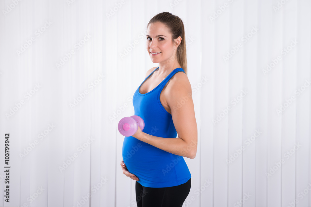 Pregnant Female Doing Exercise