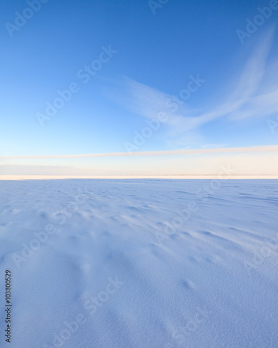 Frozen lake scape and blue sky © Juhku