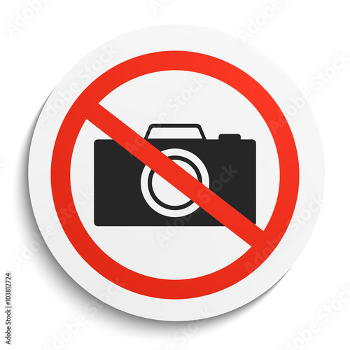 No Photos Sign on White Round Plate