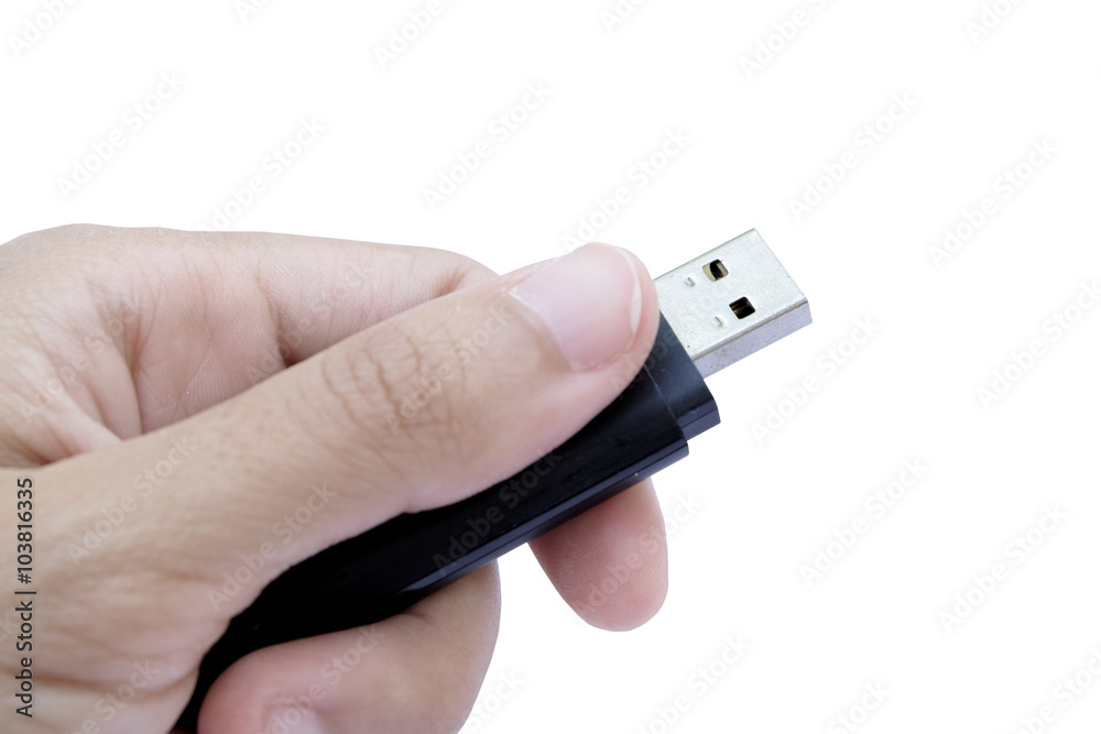 Handy drive pin out held by hand (isolated and have clipping pat Handy drive pin out held by hand (isolated and have clipping pat