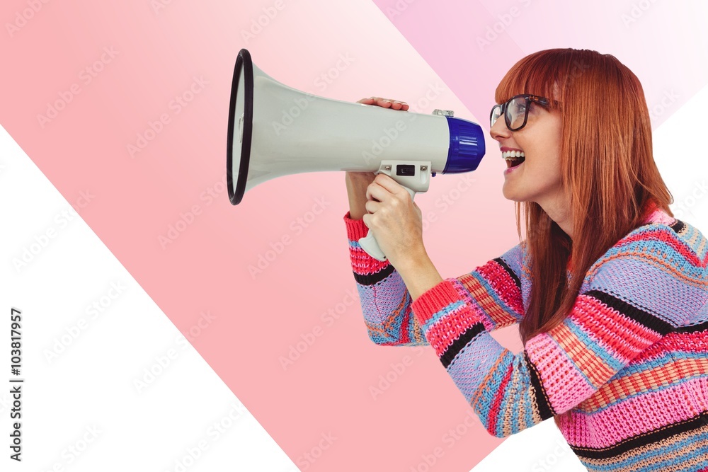 Composite image of smiling hipster woman shooting through megaphone Composite image of smiling hipster woman shooting through megaphone