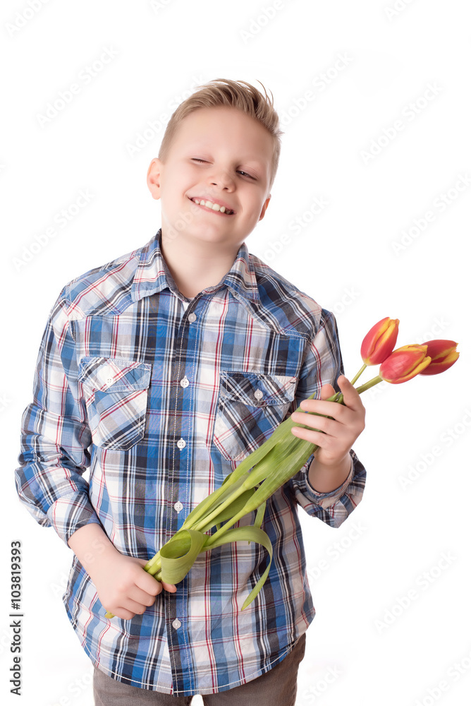Young boy with tulips isolated on white background Young boy with tulips isolated on white background