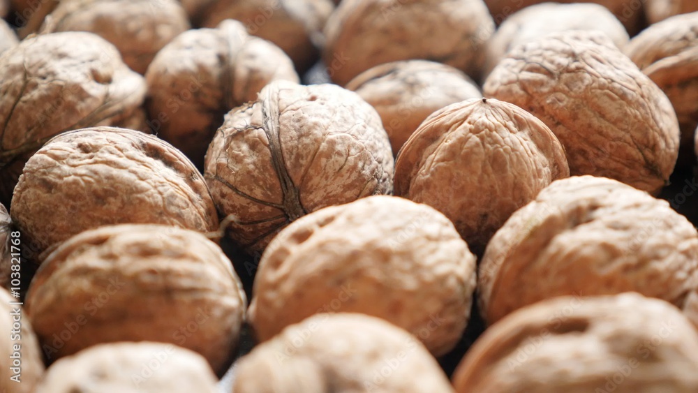 Walnuts in the hard shell arranged natural organic food 4K 2160p 30fps UltraHD footage - Juglans regia Juglandaceae family fruit healthy autumn food 4K 3840X2160 UHD video Walnuts in the hard shell arranged natural organic food 4K 2160p 30fps UltraHD footage - Juglans regia Juglandaceae family fruit healthy autumn food 4K 3840X2160 UHD video