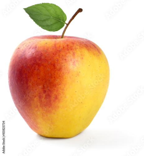Organic apple with leaf, isolated on white background.