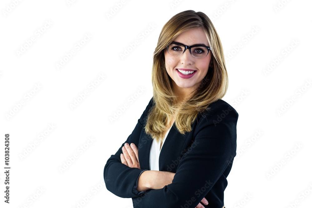 Smiling woman with arms crossed looking at the camera