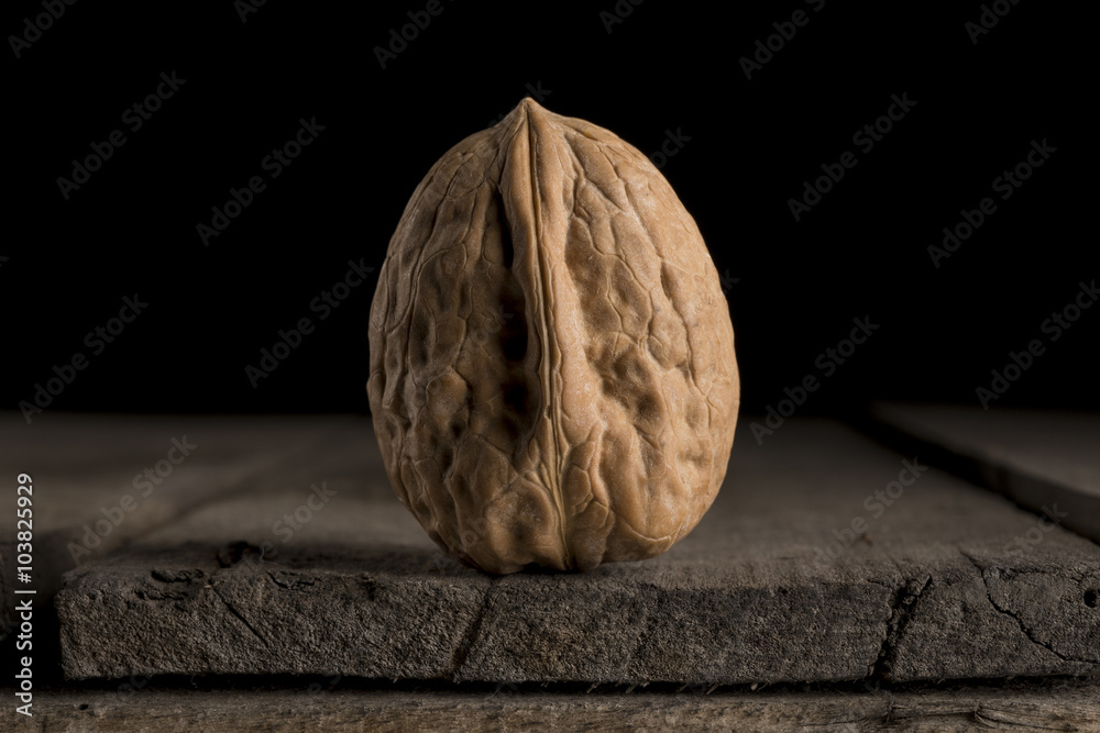 Fototapeta premium Walnut on dark background