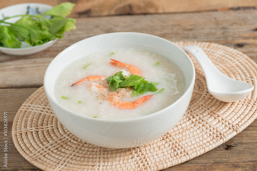 Rice porridge with shrimp in white bowl. Rice porridge with shrimp in white bowl.