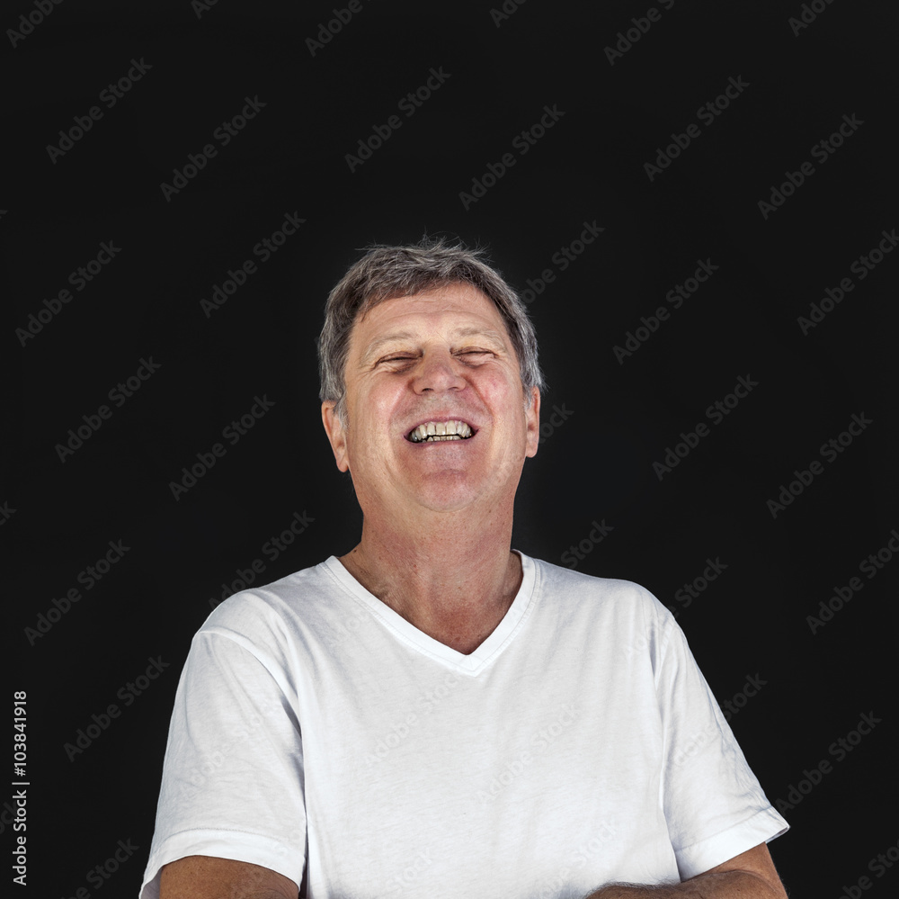 Obraz premium laughing happy casual dressed man in studio
