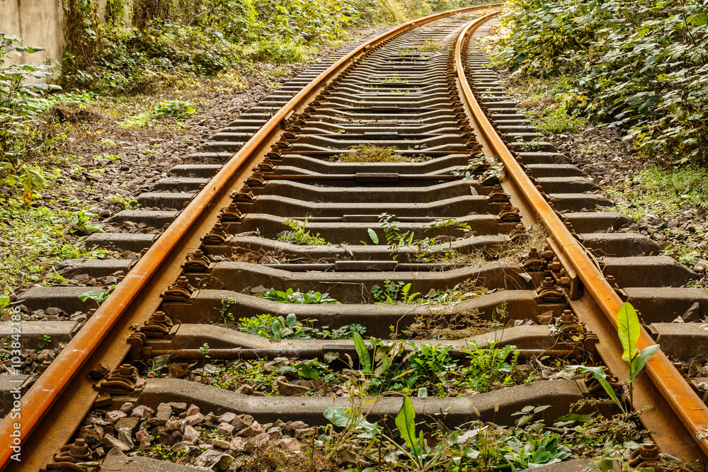 Industrial railway track in the daytime Industrial railway track in the daytime