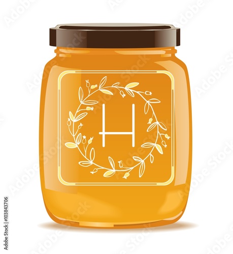 Glass jar with honey