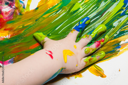 Abstract picture drawn by a child's palm on a paper