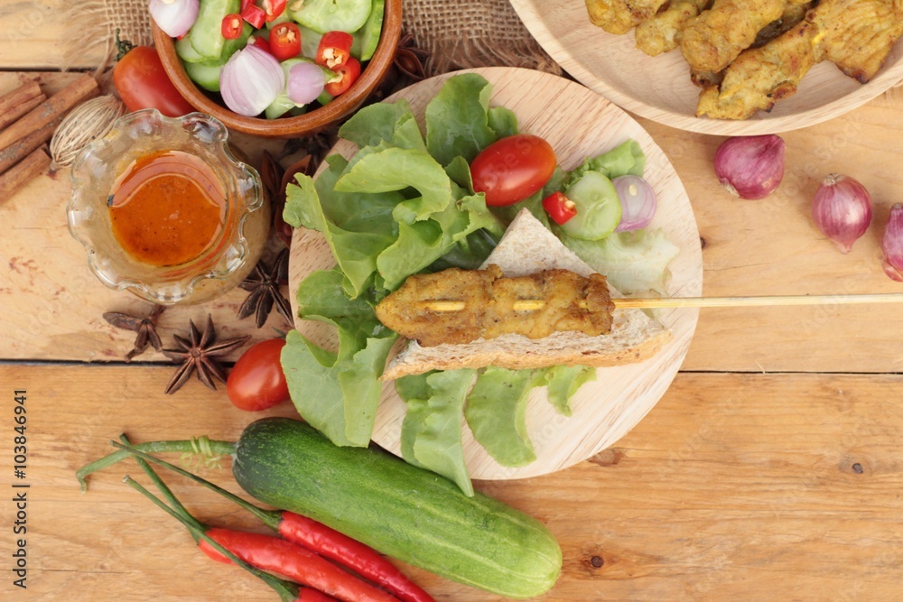 Pork satay,grilled pork with peanut sauce .