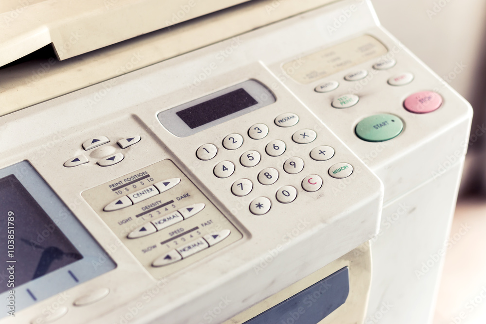 Old copiers and fax. Damaged unavailable and dusty. Focus on the numbers Old copiers and fax. Damaged unavailable and dusty. Focus on the numbers