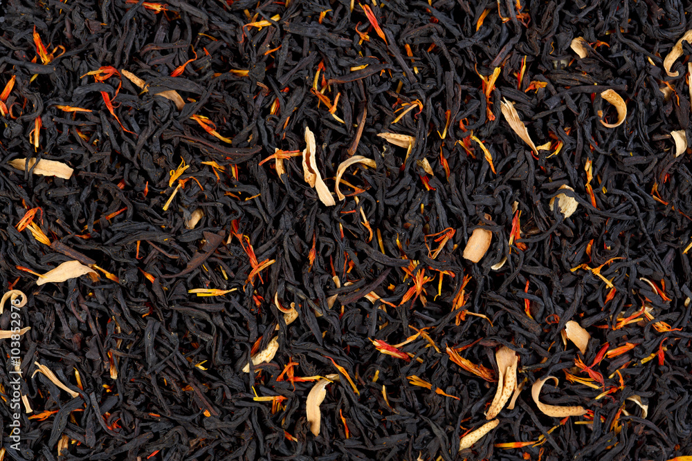 Black tea with orange peel, pieces of papaya and marigold petals Black tea with orange peel, pieces of papaya and marigold petals