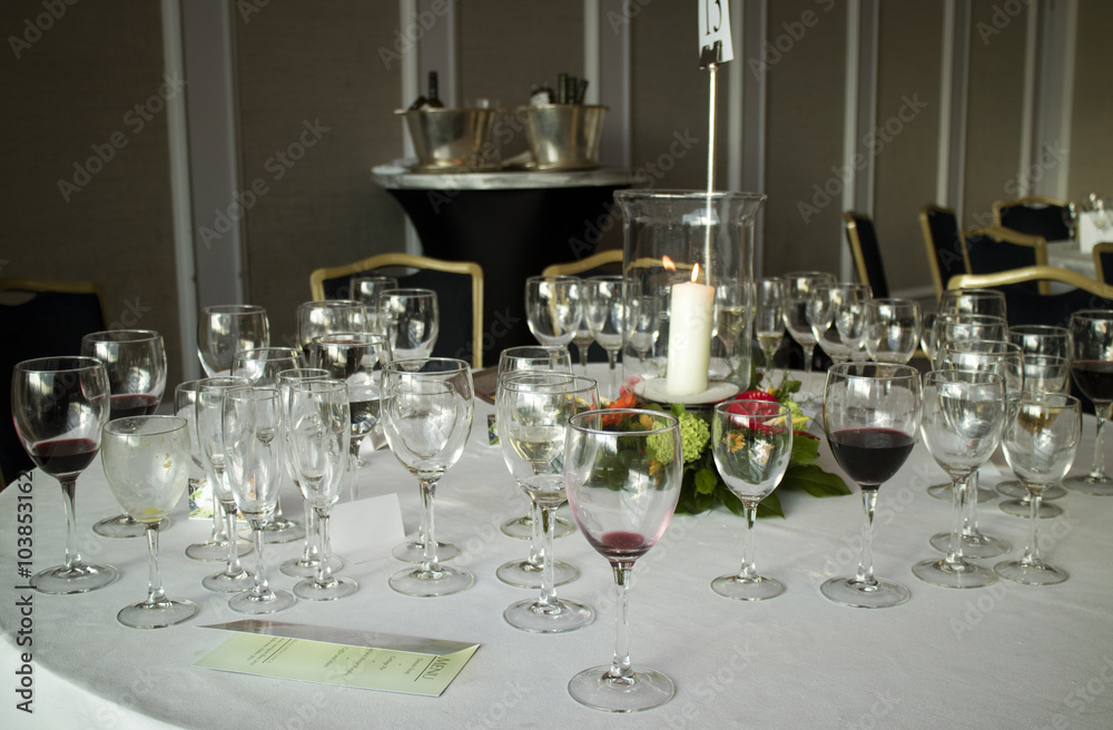 Aftermath of a lunch table with empty wine glasses Aftermath of a lunch table with empty wine glasses