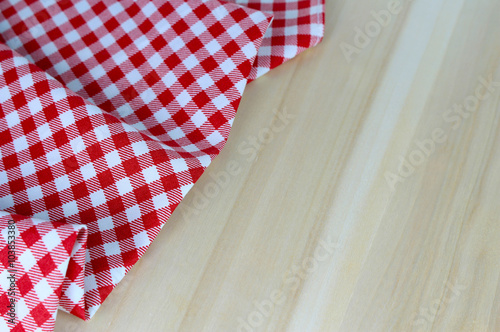 Wooden table covered with tablecloth