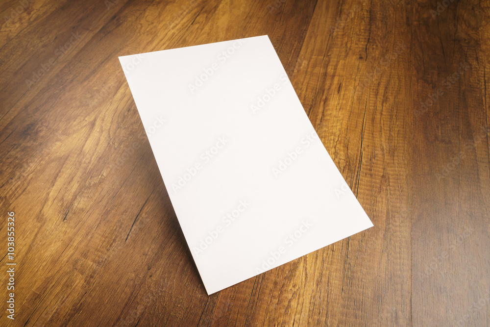 White template paper on wood texture White template paper on wood texture