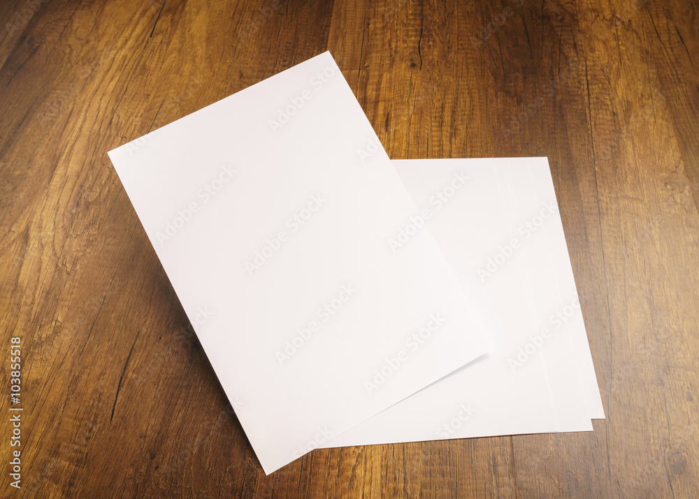 White template paper on wood texture White template paper on wood texture