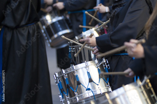 people drumming during Holy Week in Teruel, Spain