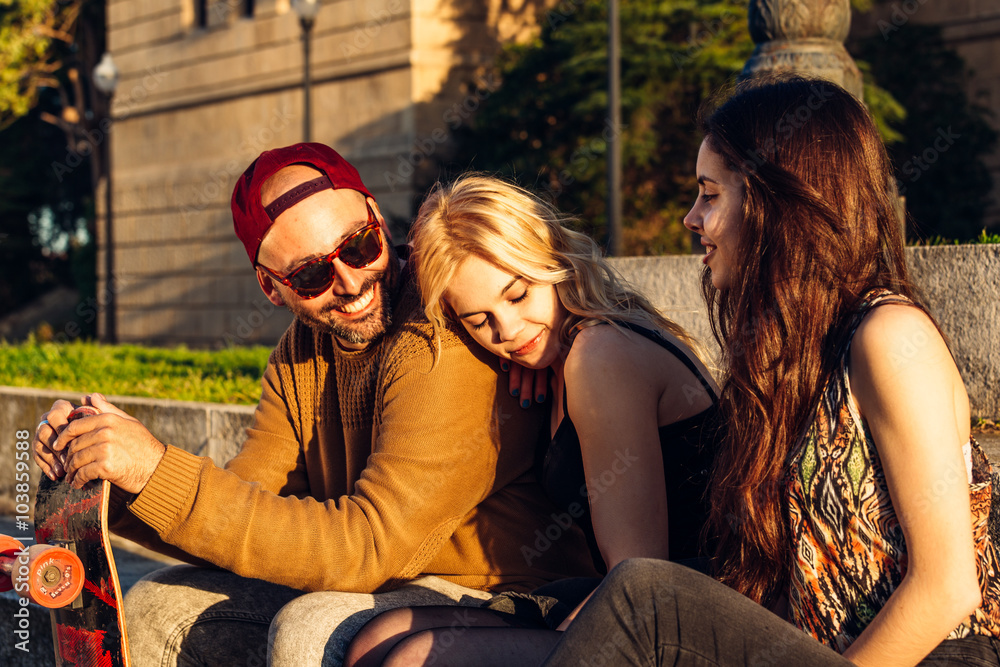 Three friends having fun on the street Three friends having fun on the street