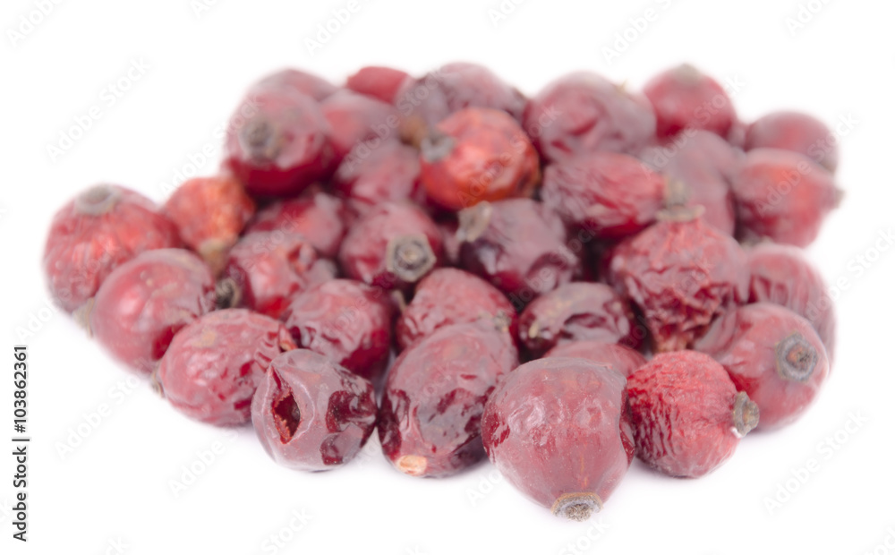 Dried rose hips ona white background Dried rose hips ona white background