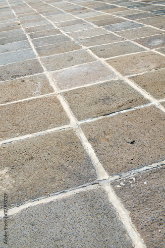 Ground / Stone brick road pavement texture background.