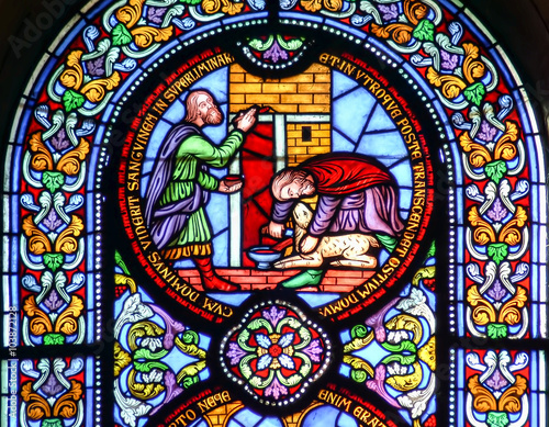 Stained glass window depicting sacrificing the lamb