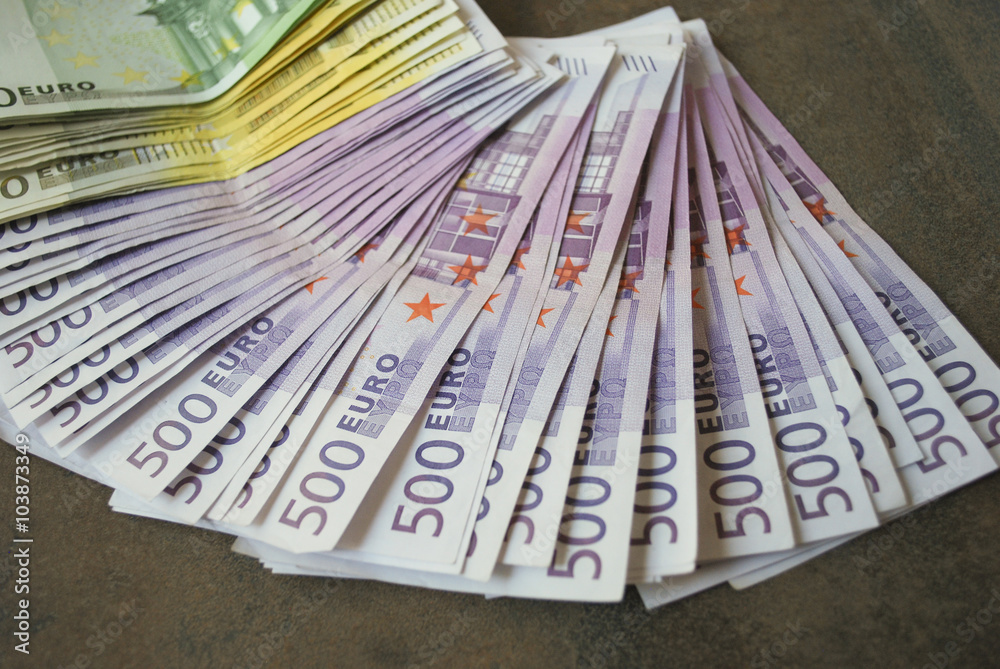 Cash Euro banknotes spread out on the table. Cash Euro banknotes spread out on the table.