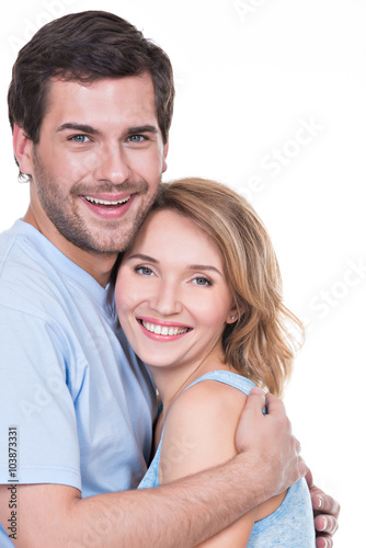 Happy young couple in embrace.
