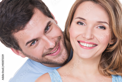 Closeup portrait of beautiful happy couple.