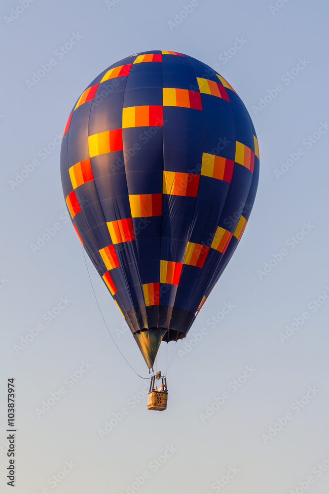 Naklejka premium Colorful hot air balloon in the blue sky, festival