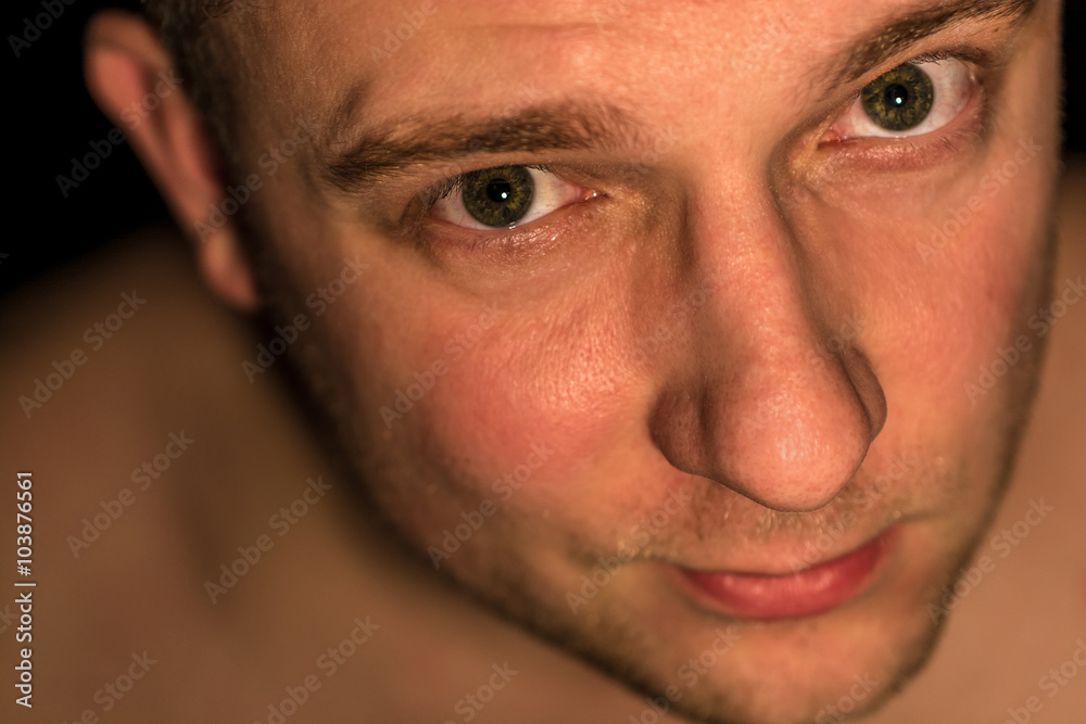 Obraz premium Man looks doubtful and skeptical