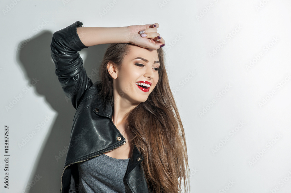 Naklejka premium Cheerful cool girl is expressing positive emotions