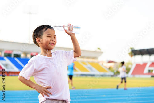 Boy and bottle of water
