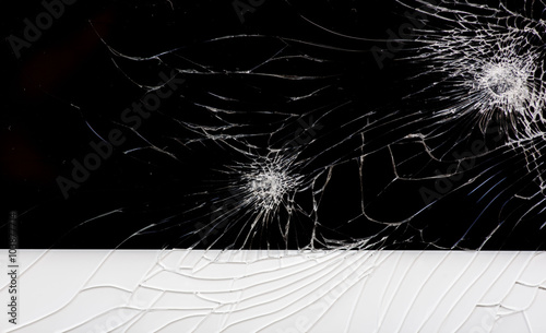 Broken glass on black