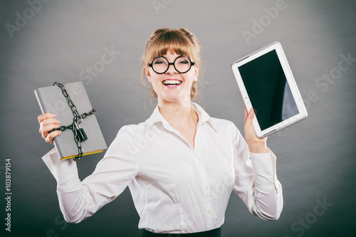 Woman with document and tablet. Digital storage. photo