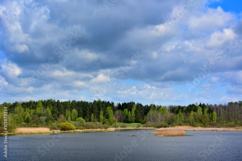 Fototapeta Naklejka Na Ścianę i Meble -  Colorful sunny spring landscape with lake