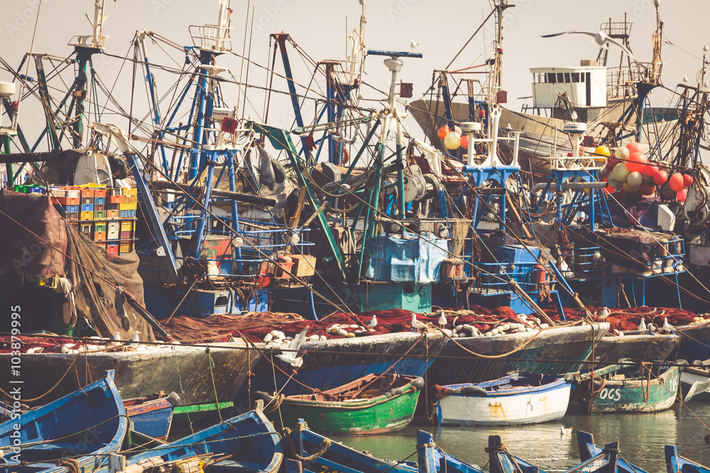ESSAOUIRA, MOROCCO - MAY 4, 2013: blue fishing boats in the port